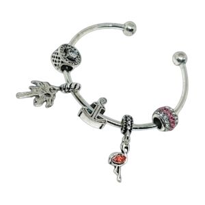 Silver Tone Open Cuff Bracelet with Assorted Charms. NWOT